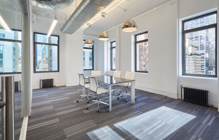 ABS placed carpeting in meeting rooms in the prebuilt offices.