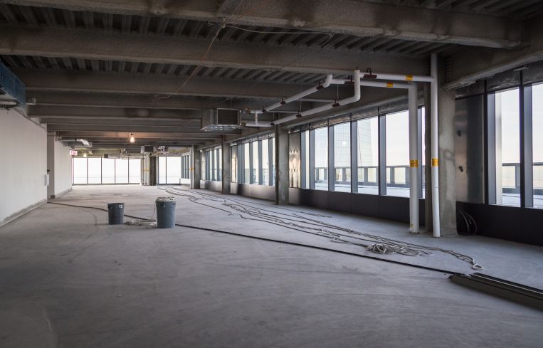 Floors are column free and have 13.5-foot ceiling heights.