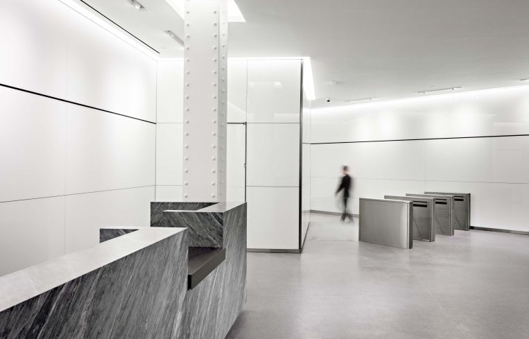 There is a marble security desk.