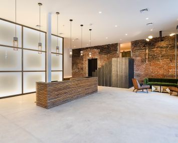 The renovated lobby features more light and wooden fixtures.