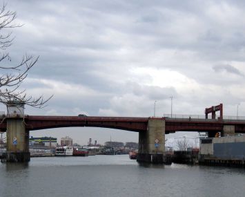 The Pulaski Bridge spanning Newton Creek in front of the Zenith Energy petroleum facility.