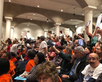 Protesters scream "Shame!" and "Shut it down!" as the Rent Guidelines Board voted down a possible rent freeze on Thursday night.