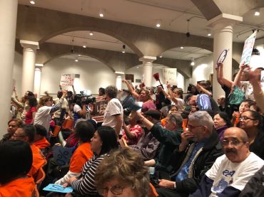 Protesters scream "Shame!" and "Shut it down!" as the Rent Guidelines Board voted down a possible rent freeze on Thursday night.