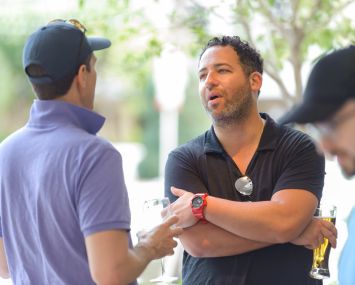 Jared Epstein of Aurora Capital (right) talking to Zachary Pomerantz of AR Global