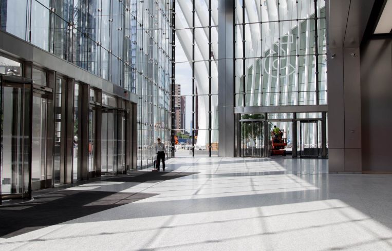 Looking out from the glass-clad, cable-net-wrapped lobby of 3 World Trade Center.