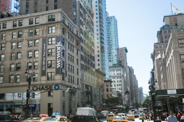 349 Fifth Avenue, left, when WeWork was a tenant. The coworking giant closed the location in 2021. 