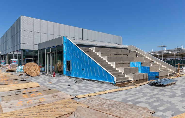Public space at Empire Outlets includes a staircase to nowhere with a green roof on top. A 1,200-square-foot seasonal pop-up will be housed underneath it.