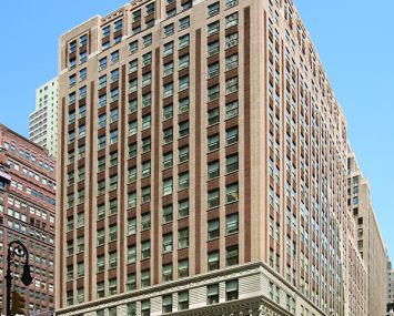 The 18-story street corner building at 501 Seventh Avenue.