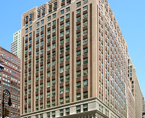 The 18-story street corner building at 501 Seventh Avenue.