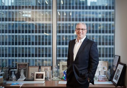 Josh Kuriloff, pictured in his office at Cushman & Wakefield, helped assemble an 800,000-square-foot lease for Pfizer at 66 Hudson Boulevard.