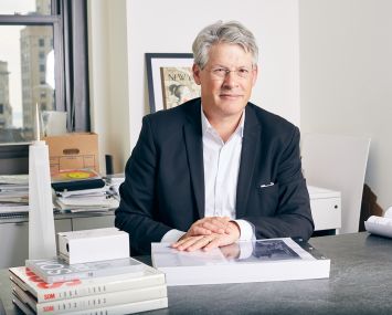 Ken Lewis of Skidmore, Owings & Merrill helped oversee the construction of some of New York City's largest projects, including One World Trade Center, a model of which sits to his left.