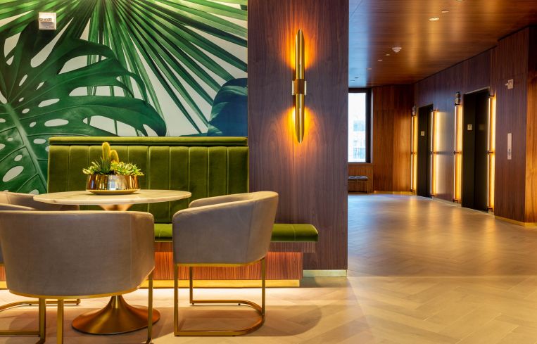 A modern take on 1930's art deco is featured in the seating area of the 7th floor lobby at 10 Grand Central.
