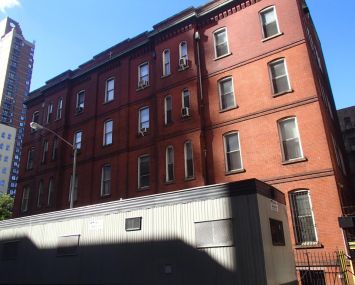 The current four-story property at 323 East 61st Street.