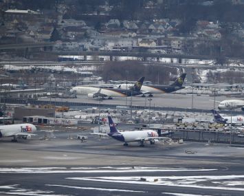 Cargo planes wait on the ramp at Newark Liberty International Airport in N.J.