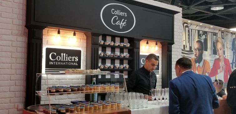 Colliers International serving up baked goods and champagne on the floor of MAPIC.