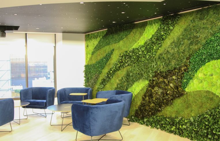A break room at EY's revamped offices in downtown Los Angeles brings some of the outside in with textured materials.