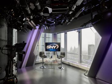 SportsNet New York's new studios in 4 World Trade Center feature floor to ceiling windows and accent lighting. 