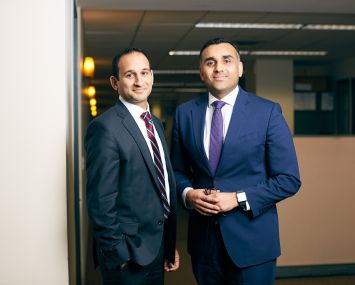 Paimaan Lodhi (left) and Reggie Thomas are the new REBNY data experts.