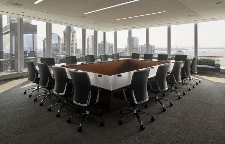SportsNet NY and Sterling Equities share new offices in 4 WTC, so spaces like conference rooms were designed with a more conservative vibe in mind.