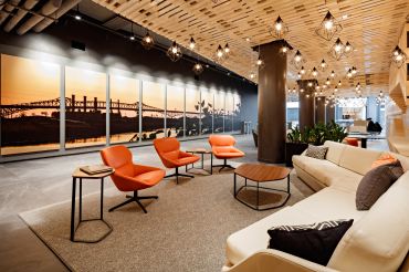 Redesigned Harborside 2 building lobby, featuring a panorama display of the Pulaski Skyway, taken by Jersey City-based photographer Joe Velez 