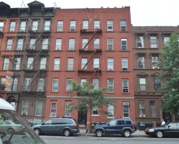 312 East 116th Street, one of the properties co-owned by Amit Doshi and Michael Besen.