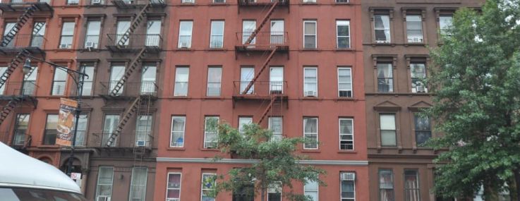 312 East 116th Street, one of the properties co-owned by Amit Doshi and Michael Besen.