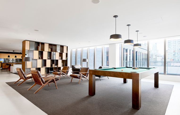Along with its commercial projects, DXA Studio oversaw the residential design of 242 Broome Street at Essex Crossing.