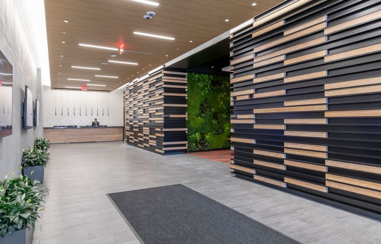The lobby of 375 Pearl Street was carved out of what used to be a loading dock.