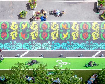 Public art and streetscape amenities along the pedestrian plazas on Broadway, in the heart of the Garment District.