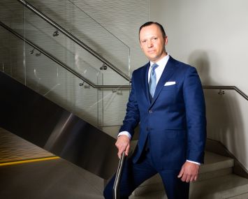 Stephen Preuss at C&W's midtown office.