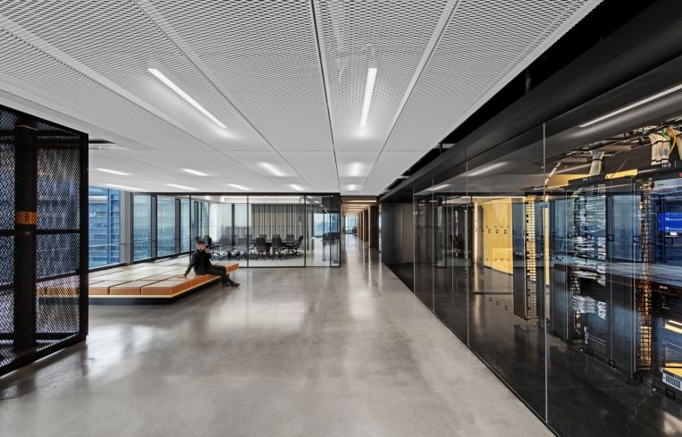 Large open spaces, glassed-in conference and board rooms and polished concrete floors are major features of IEX's space.