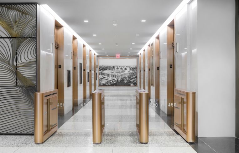 The renovation included new brass turnstyles and brass elevator surrounds.