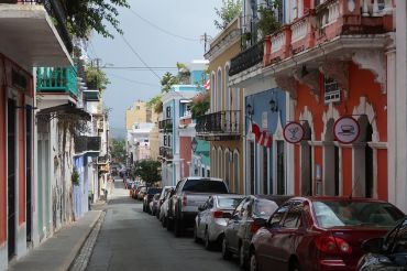 A shot of a street within the neighborhood of Old San Juan. 