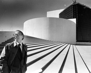 I.M. Pei stands outside the John F. Kennedy Presidential Library in Boston, which he designed, at its opening in 1979.