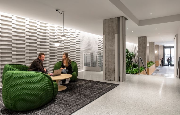 The design team also created a raised platform and custom seating to create a casual environment.