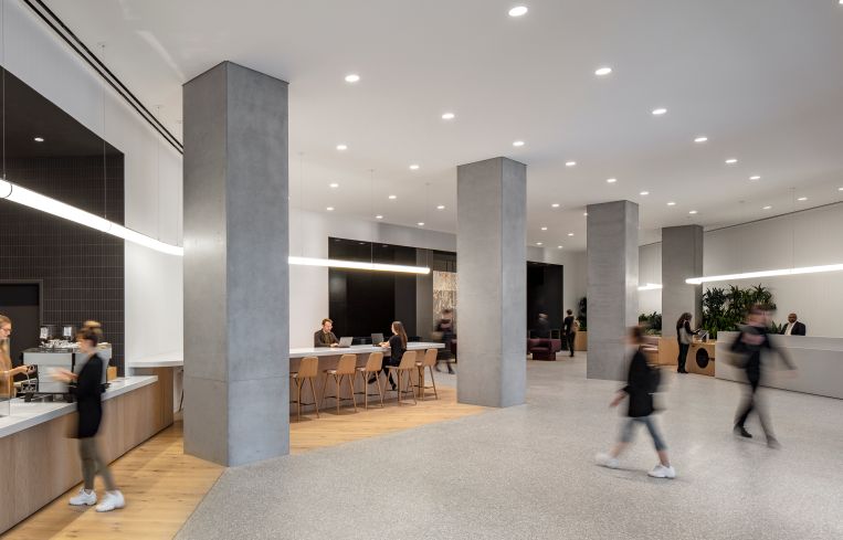 All three renovations included removing drop ceilings, exposing the original concrete columns and removing linoleum to expose concrete floors. For 75 Varick, there was also a new coffee bar run by Blue Bottle.