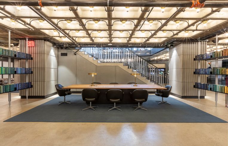 A large communal table, complete with wifi and charging is available for tenants in the basement lounge.