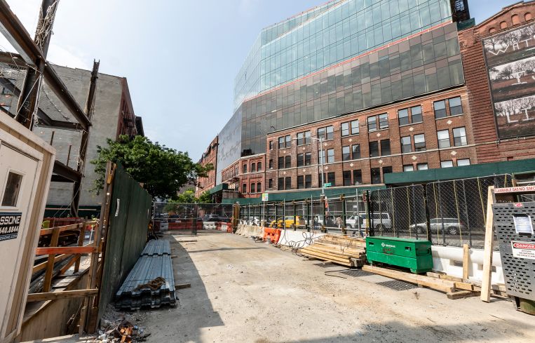 Across the street from the Taystee Building, Janus is also in the midst of expanding the Malt House, a former brewery, with several stories of new glass office space. Both buildings are part of what Janus has dubbed the "Manhattanville Factory District."