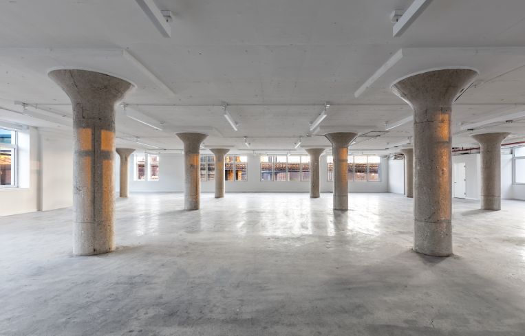The renovated fourth floor of 25 Columbia Heights still has the '20s style mushroom columns.