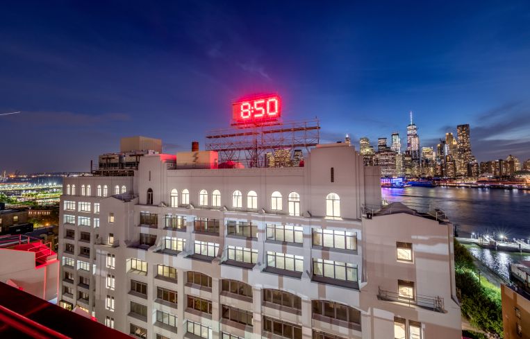 A nighttime view of 30 Columbia Heights, sans the Witnesses' iconic Watchtower sign.