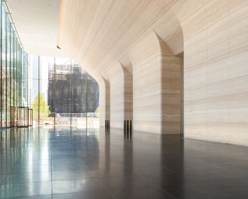 Designed by SOM, One Manhattan West's lobby features 400 tons of carved white Italian marble along the walls.
