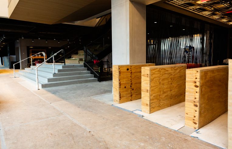 A large main stair in the lobby attempts to instill a community vibe into the building, which will be anchored by WeWork.