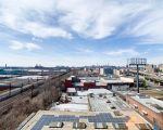 Views from the roof of Union Crossing, which faces elevated freight tracks and the Bruckner Expressway.