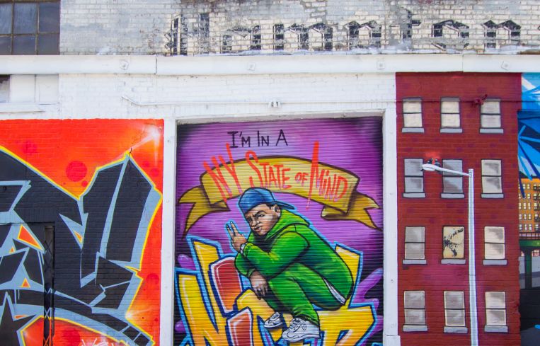 The owners worked with local muralists TATS CRU to paint a series of walls across the street.