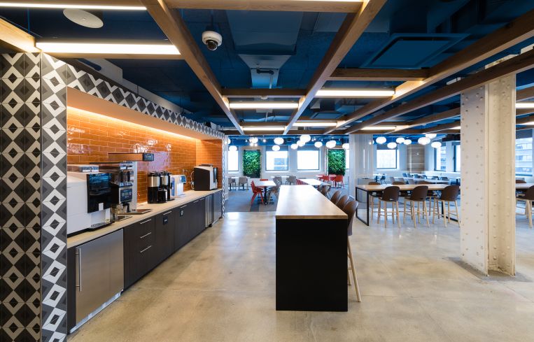 The open plan kitchen in the new cafeteria has espresso and seltzer machines.
