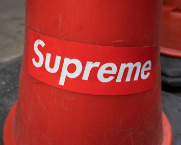 A Supreme logo on a traffic cone in London.