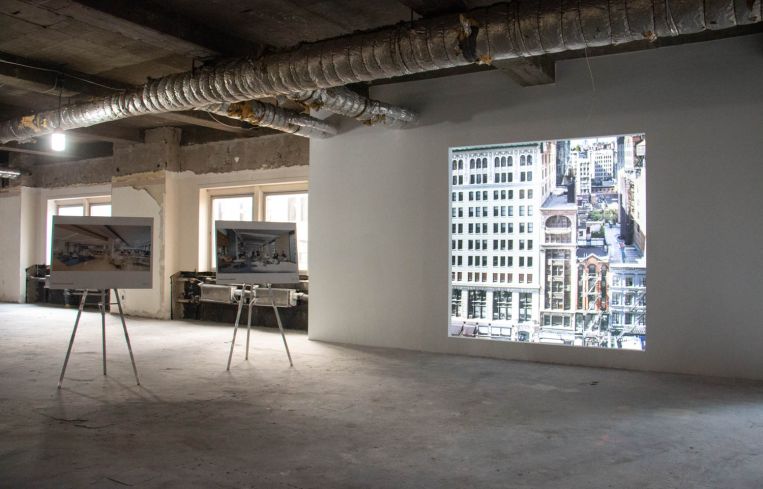 A mockup shows the size of a typical new window in the podium floor.