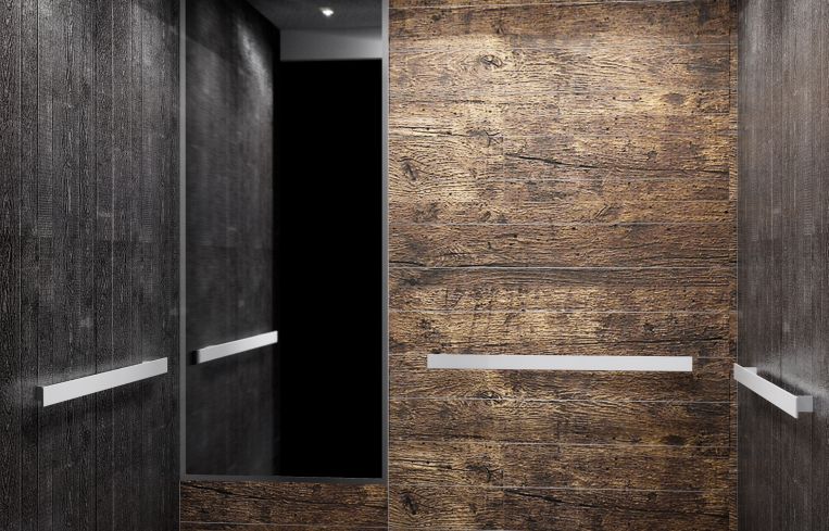 New elevators will also be fitted with blackened steel and dark wood.