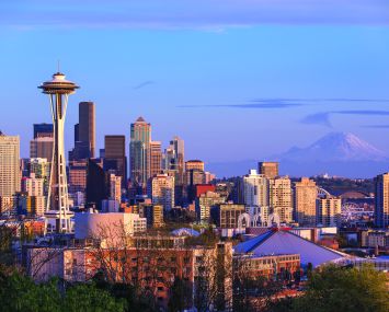 Seattle's iconic skyline with Mount Rainier in the distance.