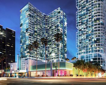 A rendering of the towers that are set to rise next to the headquarters of AIDS Healthcare Foundation, left, which opposed the project and sued the city over development in Hollywood.